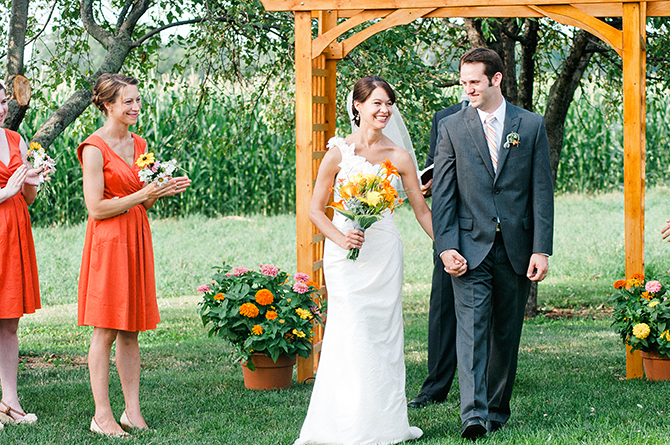 happy couple exiting ceremony at their dayton, ohio wedding
